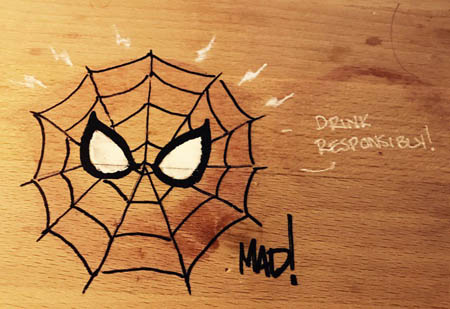 Spider-Man doodle over a wine stain (Other)