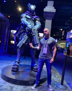 Joe Madureira at E3 with the strife statue